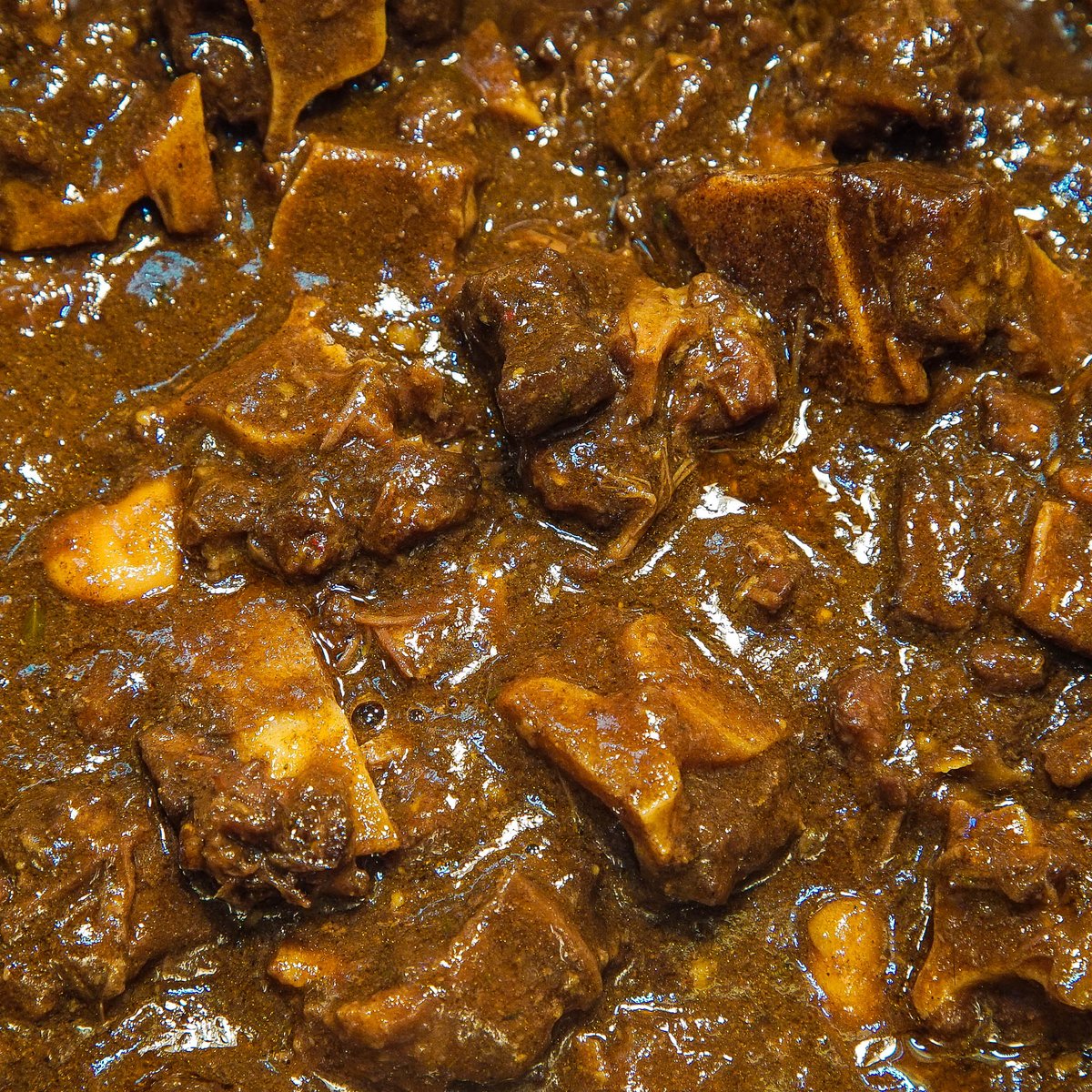 patblacks's tweet photo. Oxtail Curry.... Rich, delicious and contains actual rays of Caribbean sun! Welcome to Pat Blacks Talk of the Town! #talkofthetown #soulfood #caribbeanfood #caribbean #dumplings #riceandpeas #friedchicken #jerkchicken #oxtail #cowsfoot #reggae #currygoat #curriedgoat https://t.co/aRpvNEKxDj
