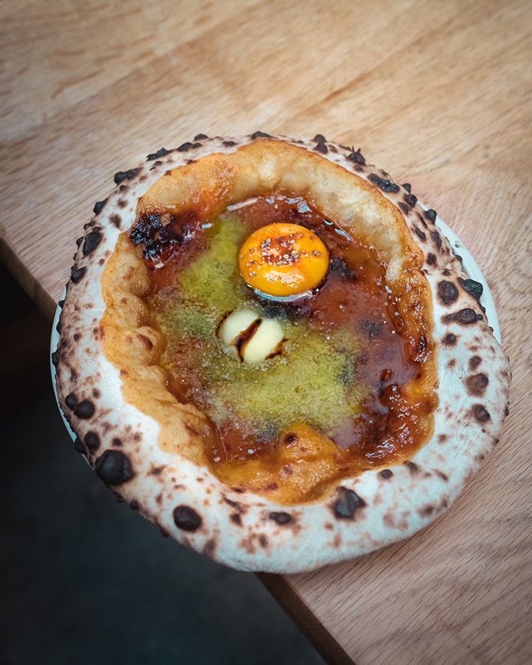 Very excited to announce the first of our guest pizzas comes from our @boroughmarket market pals <a href="/meimeilondon/">meimei</a> 💛 introducing the Kaya toast pizza with coconut Kaya jam, butter, white pepper, sweet soya and egg yolk. Available for this week only! Photo by Steele Haigh