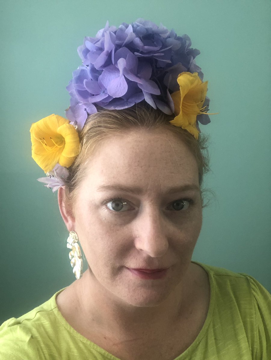 AIG_Thompson's tweet photo. Teaching an art group for Rocket to Creativity camp at Western Carolina. Monday’s challenges were to create wearable art or food art. I was inspired by Frida Kahlo and made a headband. https://t.co/tnIO8RqqAE