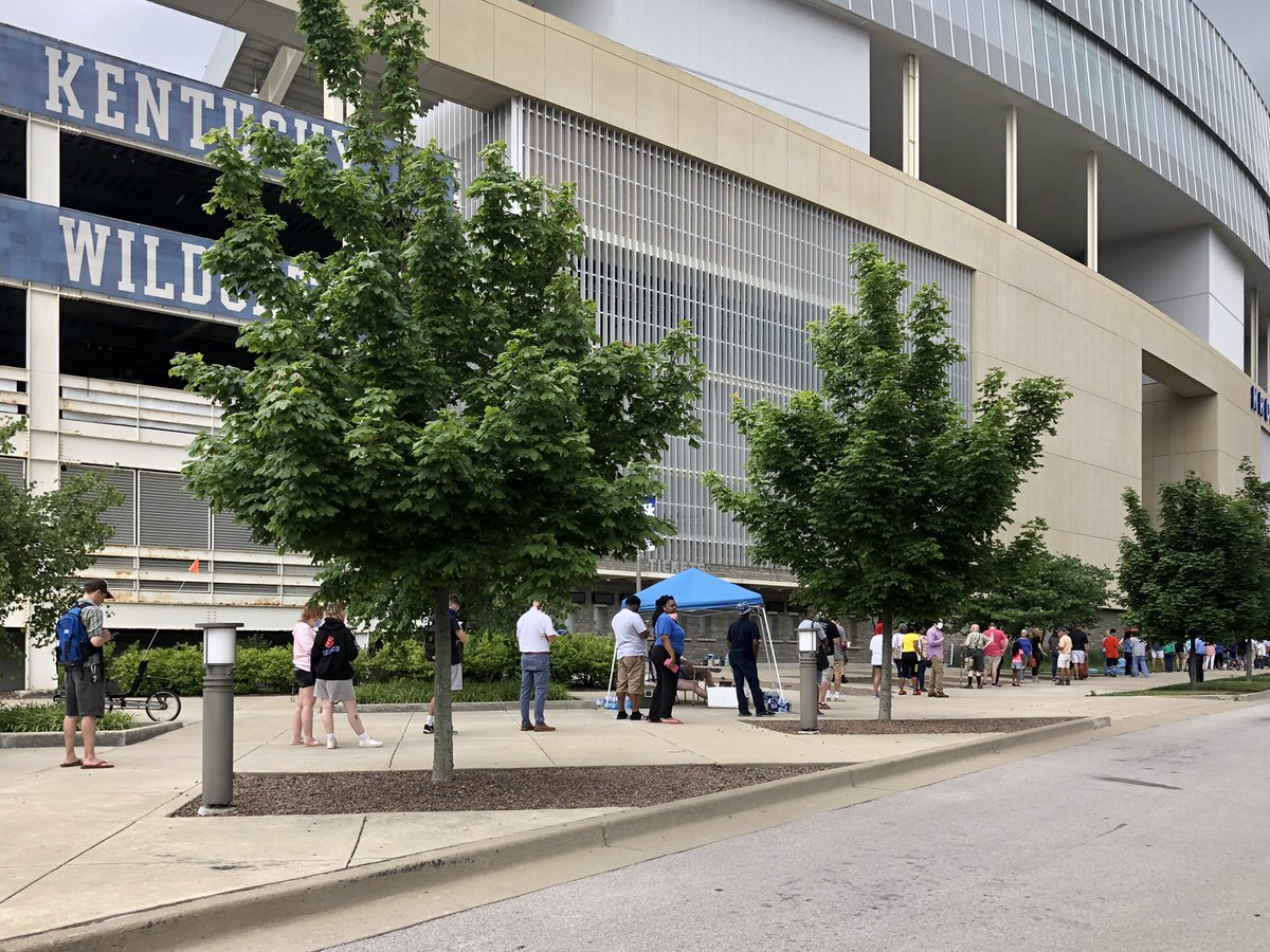 FollowBolson's tweet photo. Hundreds of voters waiting in line outside of Kroger Field in #Lexington, Ky., at 11:30 a.m. today to cast their votes in Kentucky’s #Primary #Election. #LexKy #Vote #ElectionDay #KrogerField https://t.co/9ZmqItkTeo