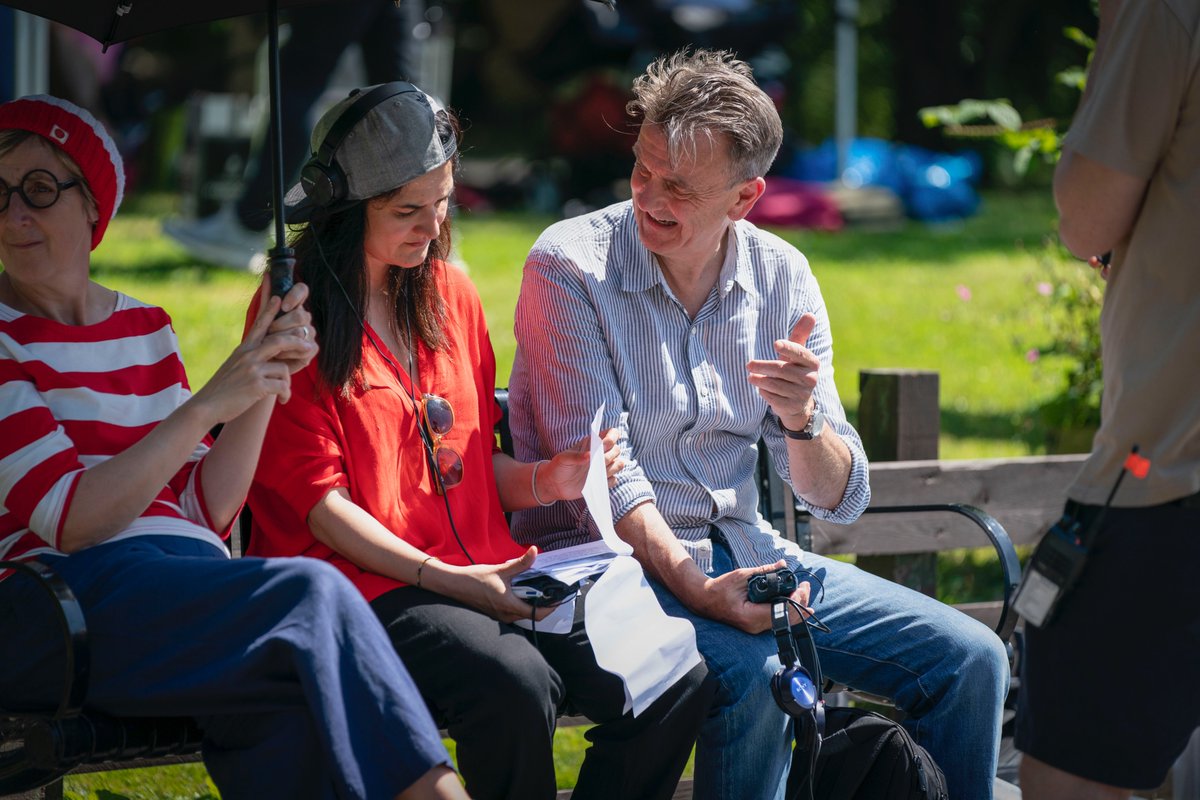 theaworduk's tweet photo. Here's a moment from another very hot and sunny day in # PlattsFieldPark, Manchester when we filmed the wonderful fancy dress walk for Series 3! This is @pbowker7 with Series Producer #ClareShepherd and of course "Our Heather" the fabulous @juliehes https://t.co/xs02dPZ100