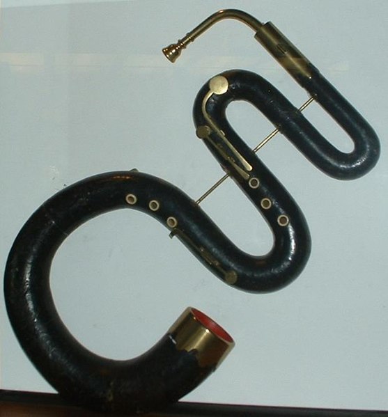Ok, the math/music bit is taking some time to write, so let's talk about weird musical instruments.Welcome to the world of keyed brass instruments, this is a serpent ('snake' in French)It plays with a brass mouthpiece, but has holes and/or keys...(1/n)