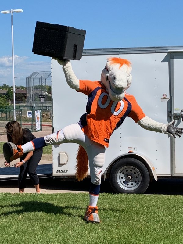 Thanks to <a href="/5280Miles/">Miles</a> from the Denver Broncos, in partnership with <a href="/FUTP60/">Fuel Up to Play 60</a>, who dropped off new cooler boxes they donated to use in our summer meal distribution! #FiveStarProud