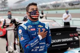 radio_marino's tweet photo. Doesn't look like @BubbaWallace is protesting the #AmericanFlag to me, as many have suggested #NASCAR https://t.co/0krZ29HZii
