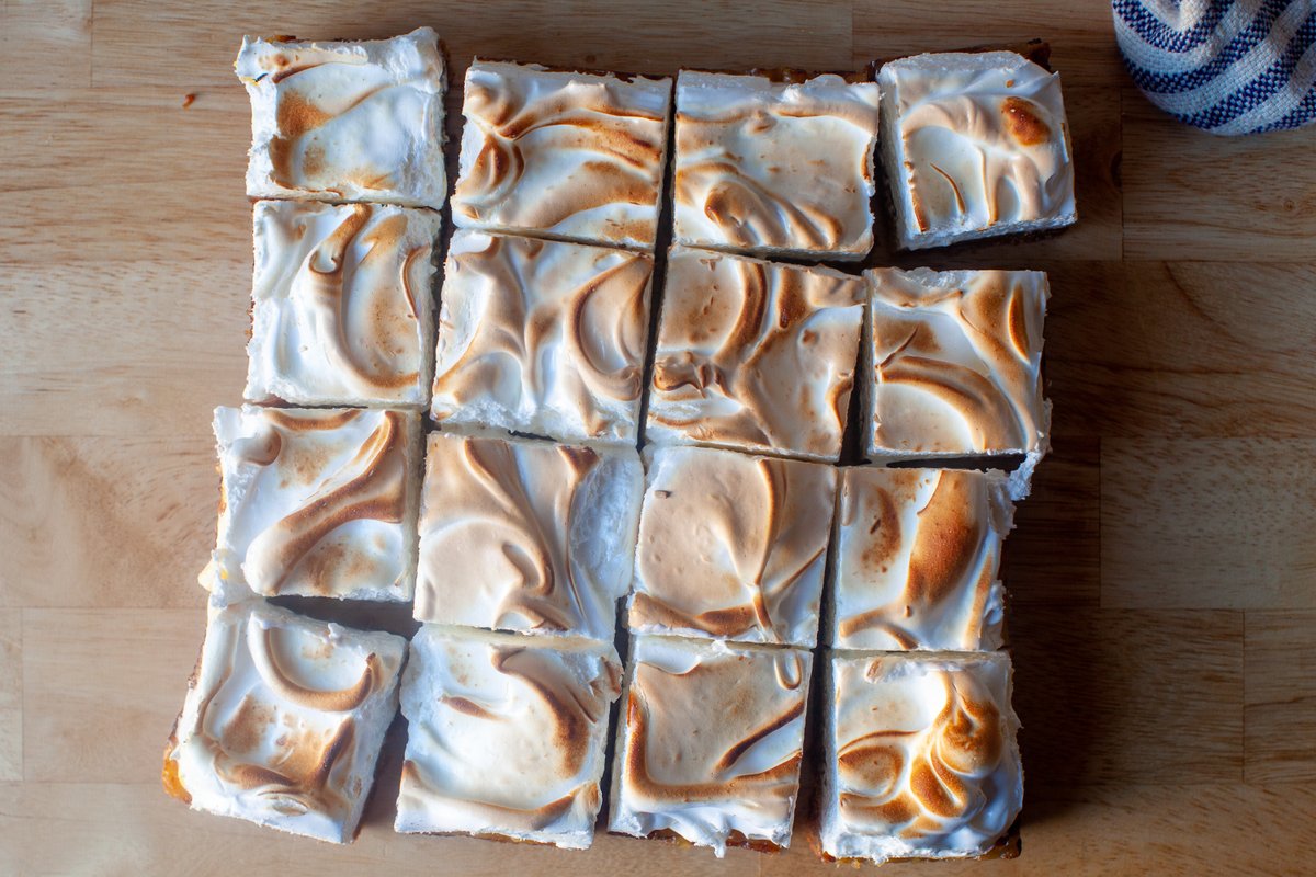 smittenkitchen's tweet photo. New: The lemon meringue pie bars of my dreams, from @SusanSpungen's new cookbook, use a whole lemon in the filling for less work and deeper flavor, perfectly sandwiched with a buttery shortbread crust and a thick swirl of marshmallow-y toasted meringue. https://t.co/fsoklJgL8Z https://t.co/Pm0a03HMNe
