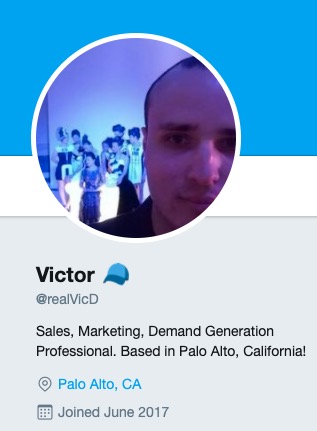Here is his real profile from cache. He is no Phd but a salesman. He works for  @EpiphanVideo and has a bachelors in commerce.