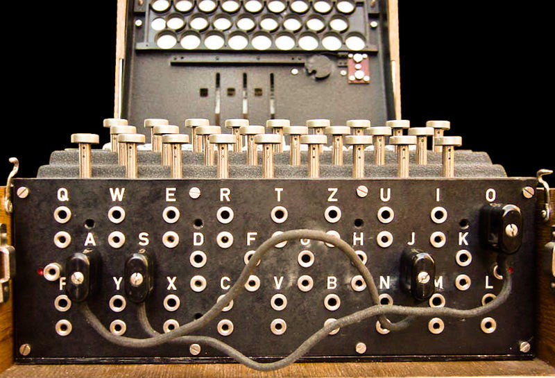 Historically, Turing is best known for his efforts in wartime codebreaking. During WWII, the Nazi forces used a machine called Enigma, which functioned as a cypher that changes settings on each keypress, to encrypt messages and communicate the location and time of air raids.