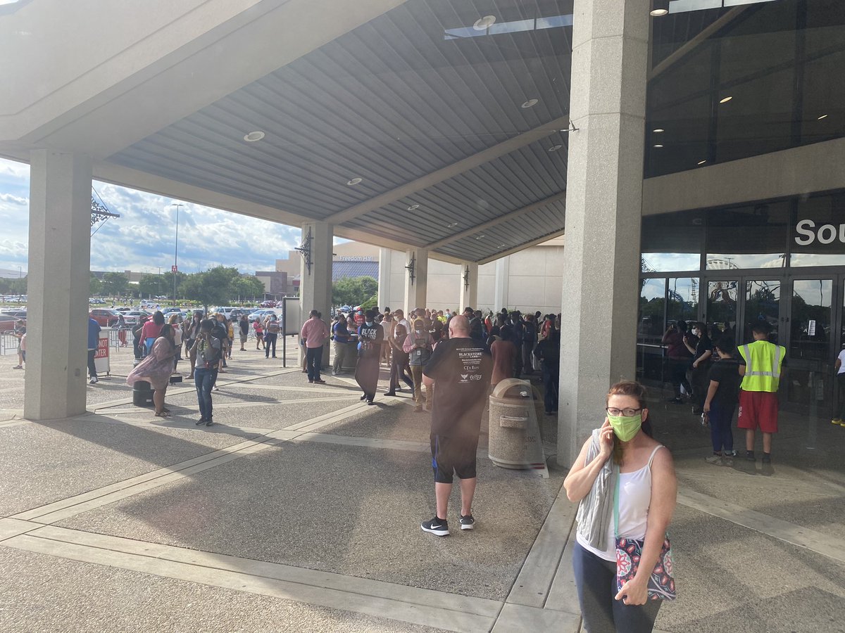 Looks like over 50 people outside upset that they weren’t allowed in to vote. The last door was locked up at about 6:03.