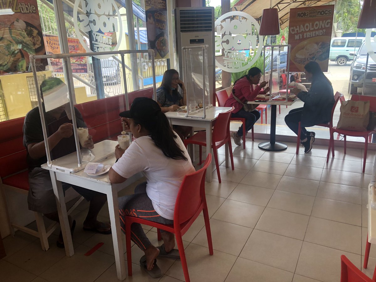 chinogaston's tweet photo. Some restaurants in Puerto Princesa, Palawan have put up plastic barriers on tables to observe social distancing protoccols. https://t.co/NaUHiwWoef
