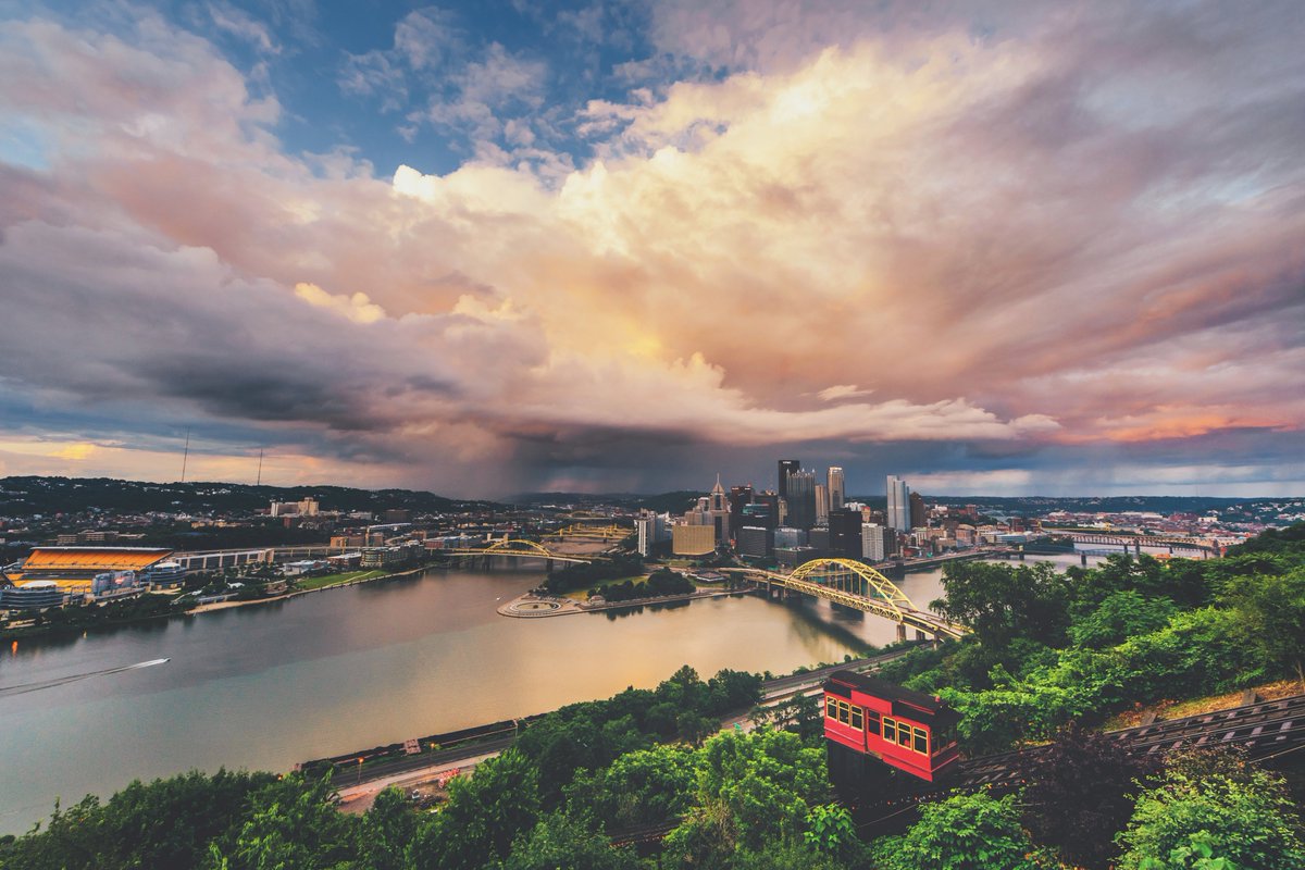 DaveDiCello's tweet image. As happy as I am with the image that I captured last night, I kinda wish the sky looked like this when there was the rainbow over #Pittsburgh. Scenes like this don't come along everyday, with the clouds lit up, rain falling all around, and blue skies overhead. Was really amazing.
