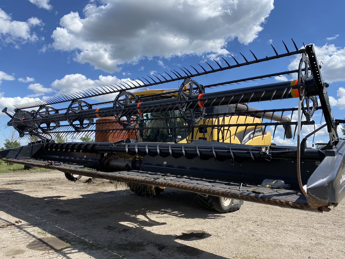Chrismansh's tweet photo. 2008 macdon d50 for sale, CNH adapter, 35’, pea auger new canvasses good shape, $26500, case of beer to the retweeter that sells it #Agtwitter #ag https://t.co/nkxlR3jasx