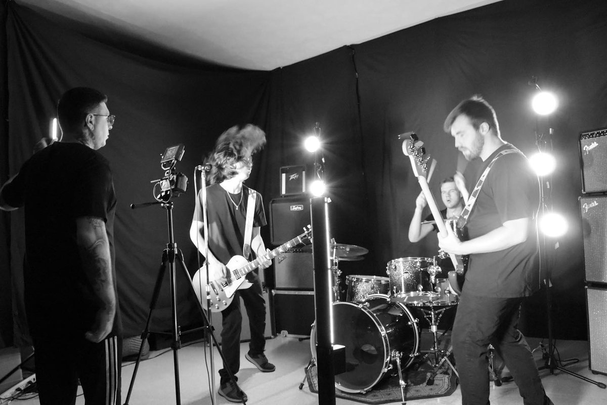 artificialsubjx's tweet photo. Badass behind-the-scenes shot on the set of our music video shoot.
•
@BerkshireAaron doing his best to keep us in line.
•
#AS2020 https://t.co/vi1nRb1S4W