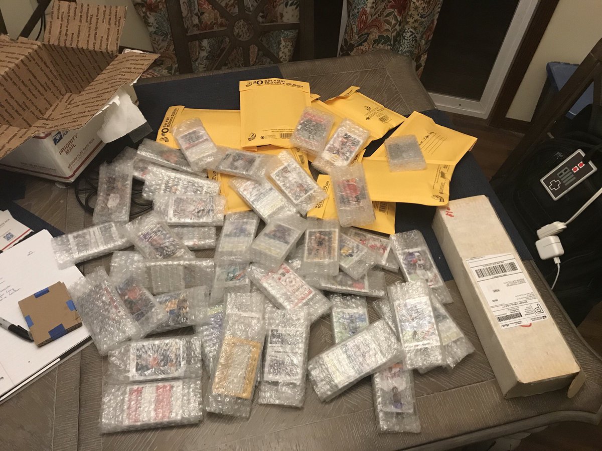 Quickly the dining room turned into the “office” where “packs” of random and mixed cards went to kids for free. Ben from  @midwestboxbreak heard about it and teamed up with Parker.