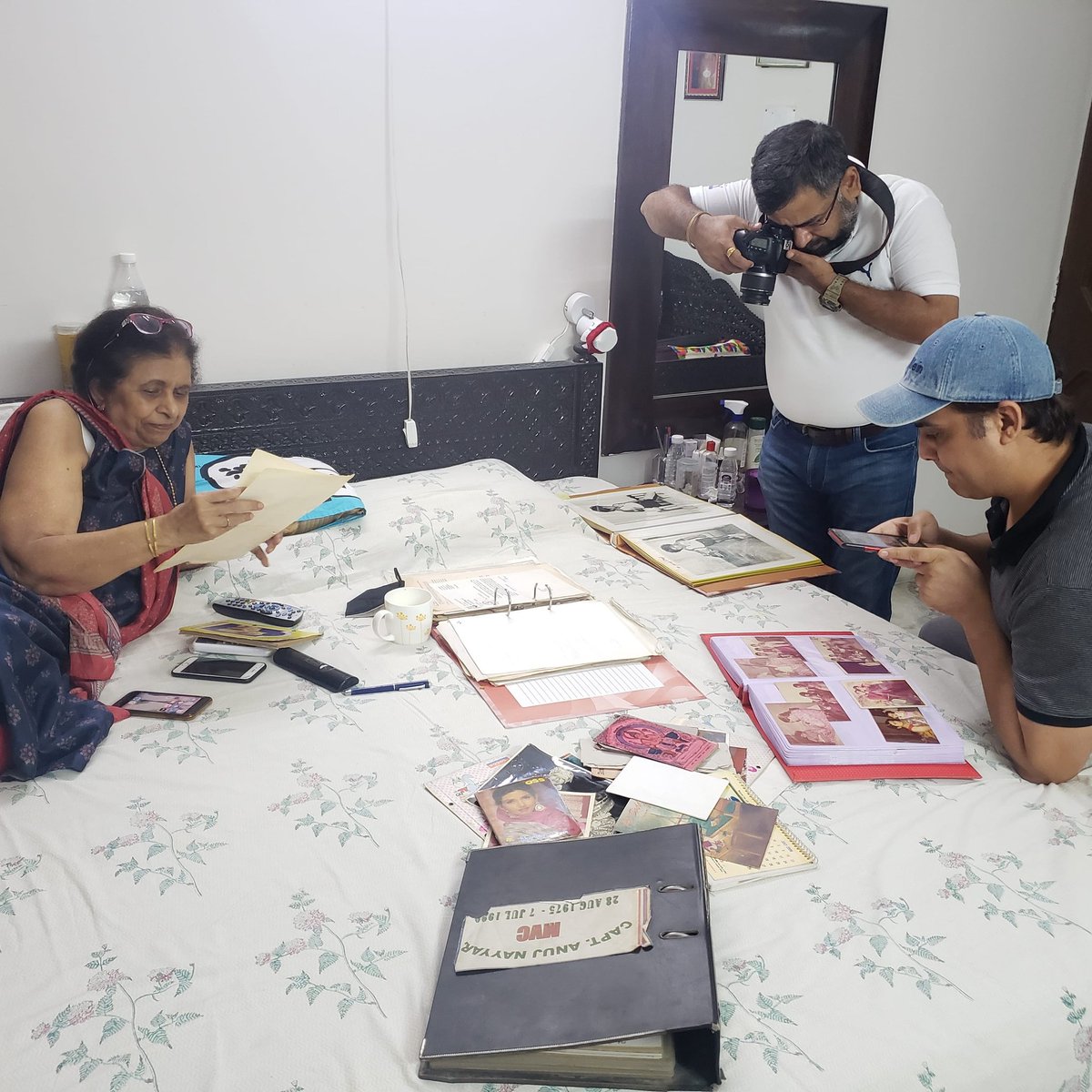 Tigerofdrass's tweet photo. Team selecting all the photographs, letters, other material which will be used in "Tiger of Drass" book. The book will have all detailed photos of Capt. Nayyar's childhood, schooling, training, war and letters written from those icy peaks of Kargil. https://t.co/DqMysHmmCR