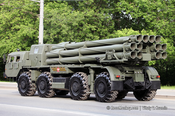 New 9A54 launch vehicle for 9K515 Tornado-S MRL system. In essence an upgraded Smerch firing 12x 300 mm rockets. Standard 9M55K rocket is 800kg & 7.6m long with 72x 9N235 HE-Frag cluster submunitions or in the 9M55F rocket, a single 258kg HE Frag parachute delivered warhead