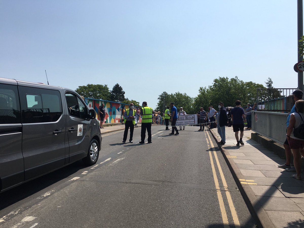 Quite the commotion on the bridge. A rough count puts it at over 50 people. TV news cameras in attendance