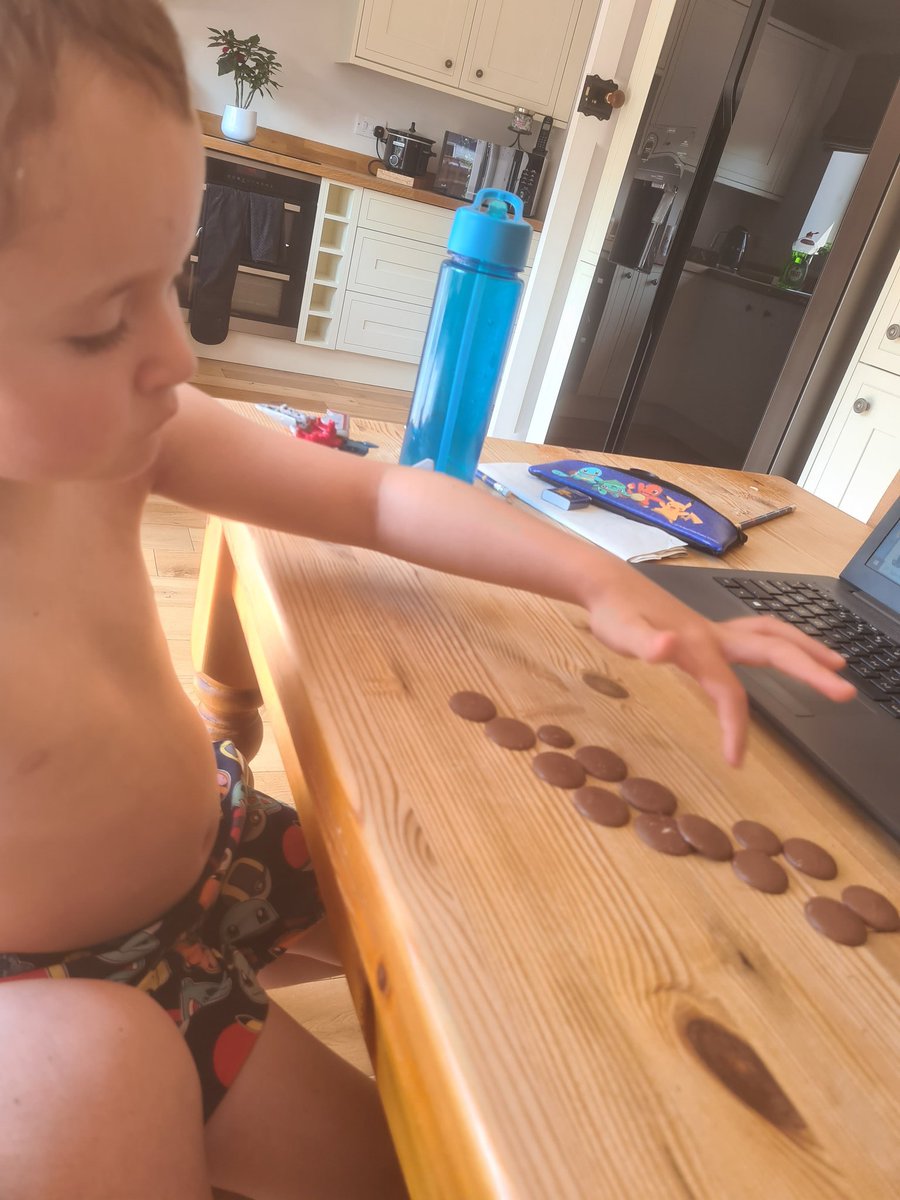 LaverackNikki's tweet photo. We have been looking at half today... always helps when choccy buttons are involved. Leo worked really hard to find half of numbers, and on his counting to and from 20 🥰 https://t.co/YoPNnR7xCl