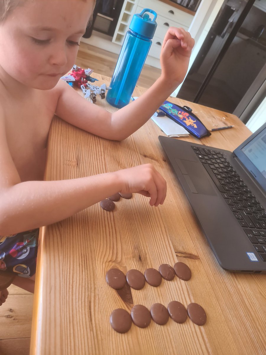 LaverackNikki's tweet photo. We have been looking at half today... always helps when choccy buttons are involved. Leo worked really hard to find half of numbers, and on his counting to and from 20 🥰 https://t.co/YoPNnR7xCl