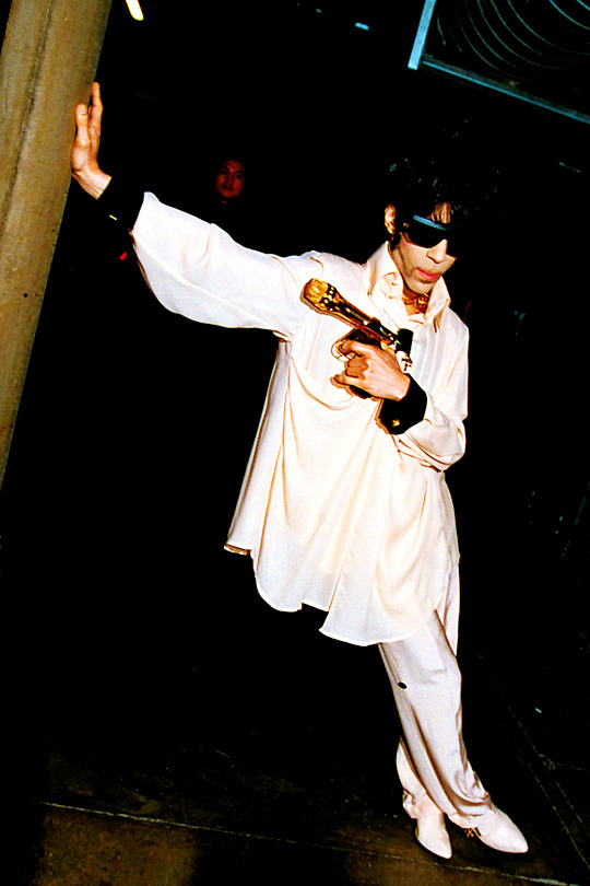 Ever since a dear friend gifted me this lifesize Promotional cutout, Prince has metaphorically watched over me, frozen in time in the Come era, that moment of momentous pain and change. I personally think you can see the physical and mental toll the fight with WB had upon Prince.