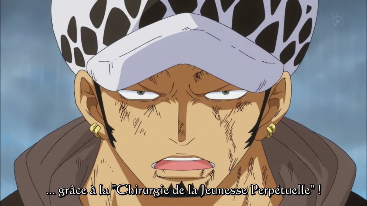  - Arc Dressrosa - 28/46Tandis que Rebecca se fait attaquer par Diamante, Kyros son père la sauve de l'assassin de sa femme.Luffy et Law sont arrivés devant Joker. Law va raconter son passé mais avant il dévoile que son pouvoir peut donner la vie éternelle :