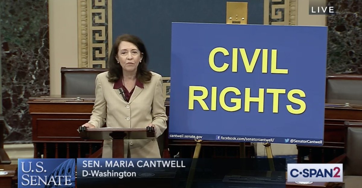 Senator Cantwell speaks from the Senate floor with a large sign that just says "Civil Rights."