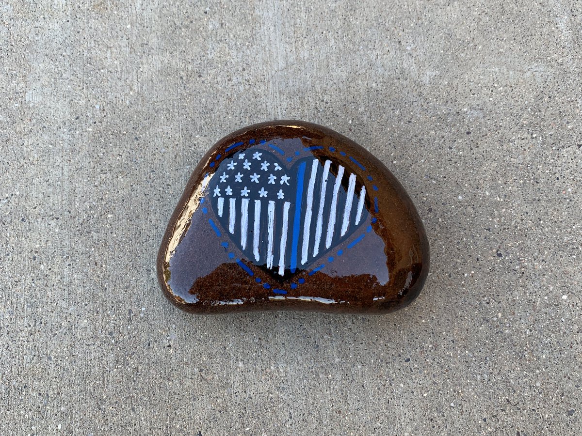 PerrinTPD's tweet image. I don’t know who put this next to my patrol car, but thank you!  I’ve been troubled by the angry rhetoric and searching for a way to help heal this country.  Gestures like this help recharge my soul.