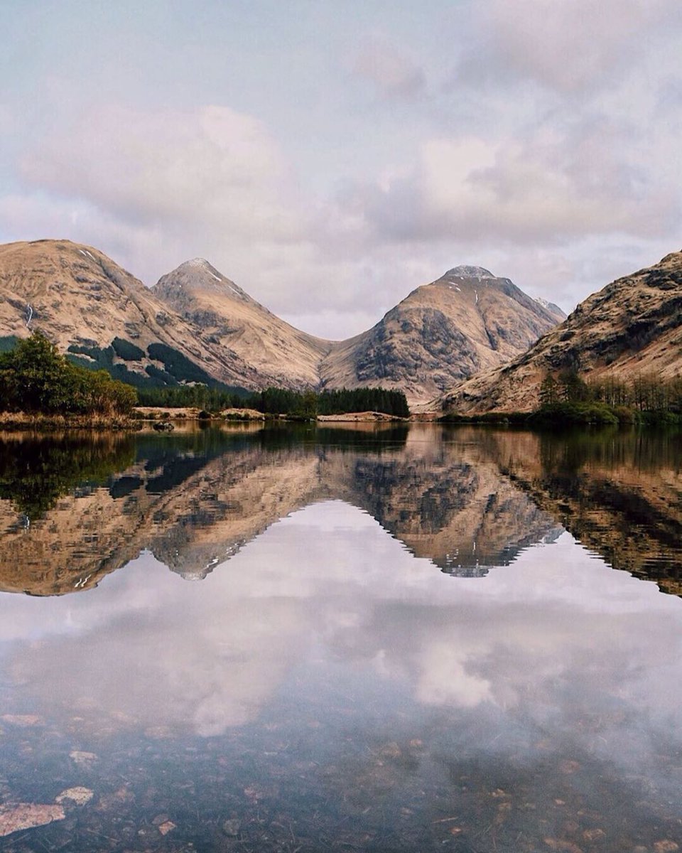 ProperAdventure's tweet photo. #properadventure with our Issue 4 contributor Eilidh Cameron the stunning Etive Mòr and Etive Beag from Glen Etive. Who’s climbed these two beauties? @VisitScotland https://t.co/TJa7vR1mCo