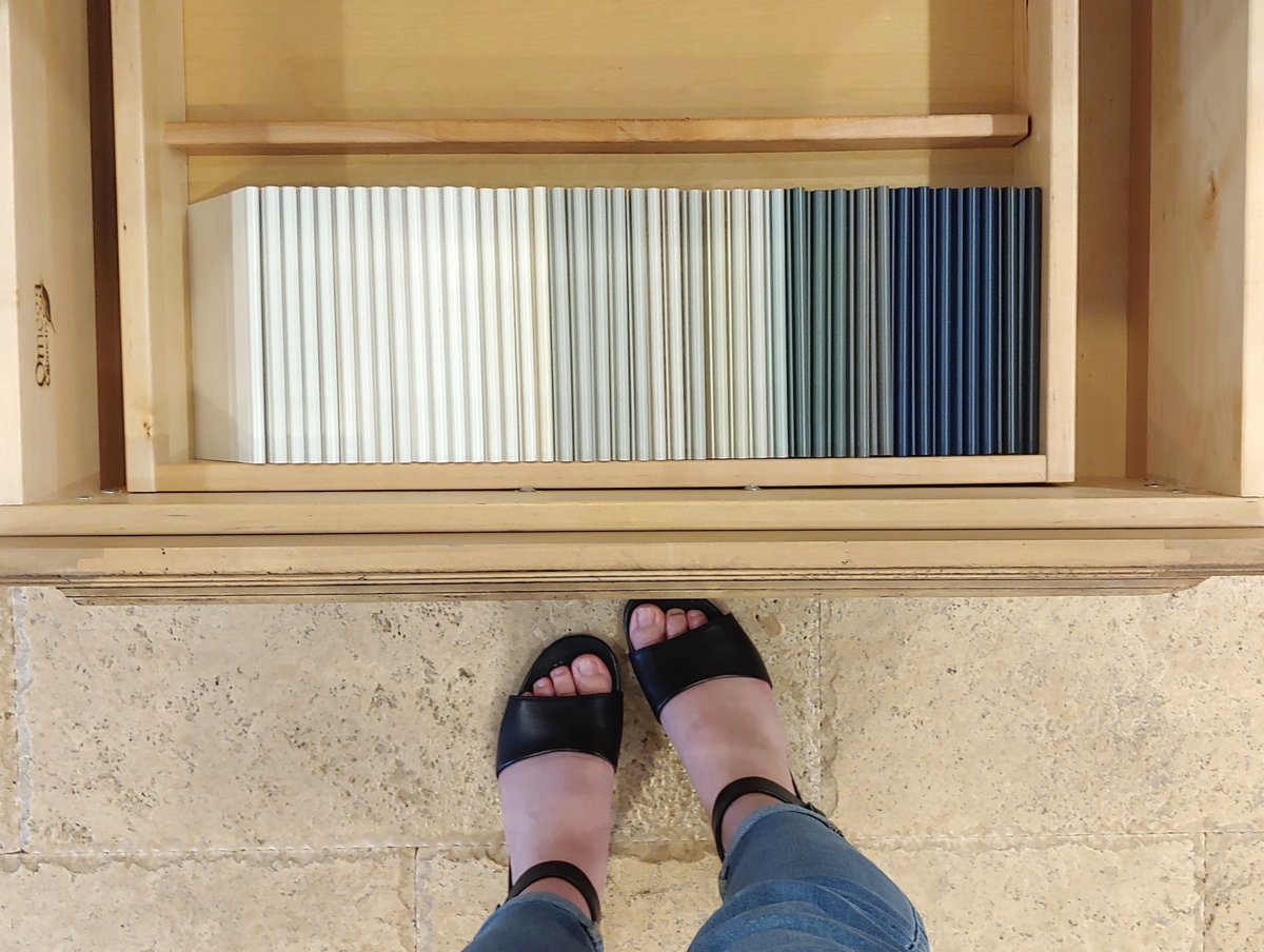Organizing our Omega Cabinetry color chip samples to prepare for the summer launch - we can't wait to get our hands on the new color samples! #oneomega #cabinetdesignerskingston #cabinetdesign