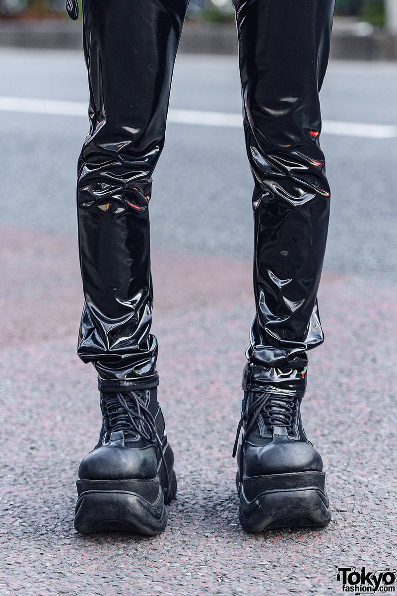 19-year-old Japanese student Nagi on the street in Harajuku wearing a barbed wire headpiece that he handmade with a Comme Des Garcons cutout top, a leather jacket, faux leather pants, and Demonia platform boots #原宿 tokyofashion.com/barbwire-cage-…