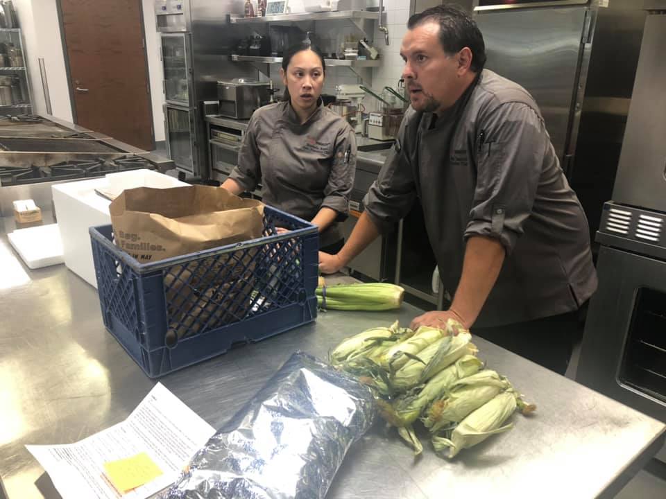 UNLVHospitality's tweet photo. Our chefs Mark &amp; Steph participated in the #24Meals initiative, which provides meals made by local chefs to Las Vegans in need.

Using a box of mystery ingredients, they prepared 24 meals of breaded pork chops on beds of Cajun hash with roasted corn sauce. Way to go, team! https://t.co/r6KcrrR49P