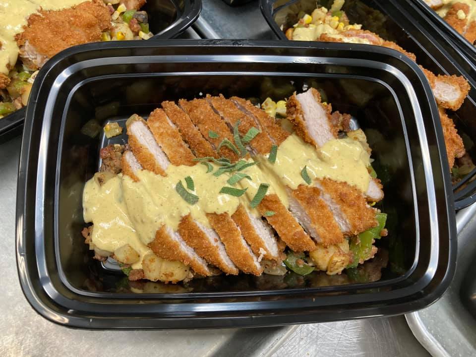 UNLVHospitality's tweet photo. Our chefs Mark &amp; Steph participated in the #24Meals initiative, which provides meals made by local chefs to Las Vegans in need.

Using a box of mystery ingredients, they prepared 24 meals of breaded pork chops on beds of Cajun hash with roasted corn sauce. Way to go, team! https://t.co/r6KcrrR49P