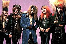 As a subculture, pioneers were bands like X JAPAN, D'ERLANGER, DEAD END and Buck-Tick in the late 80s. They drew inspiration from glam rock, punk etc and made it their own. Visual (duh) aesthetics played a huge part: extravagant costumes & makeup + gravity-defying hairstyles.