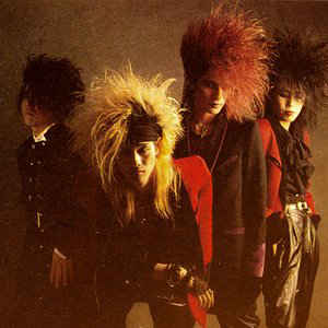 As a subculture, pioneers were bands like X JAPAN, D'ERLANGER, DEAD END and Buck-Tick in the late 80s. They drew inspiration from glam rock, punk etc and made it their own. Visual (duh) aesthetics played a huge part: extravagant costumes & makeup + gravity-defying hairstyles.