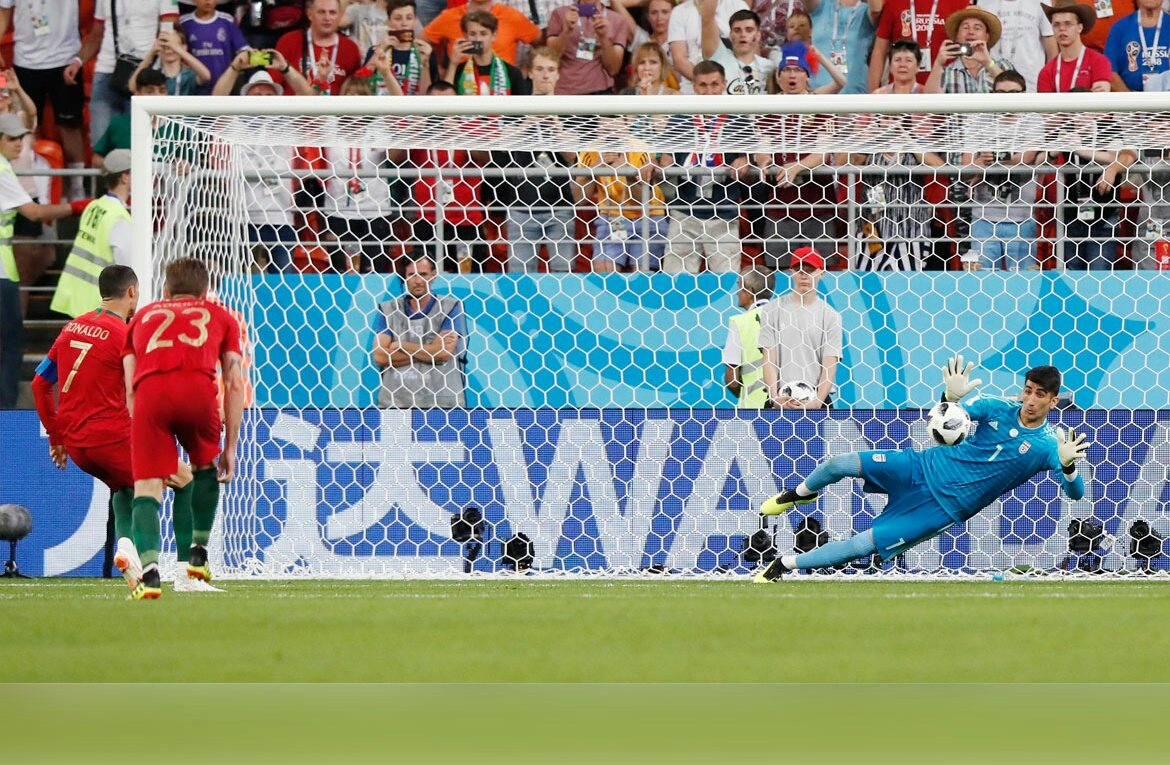Alireza Beiranvand saves Cristiano Ronaldo's penalty.