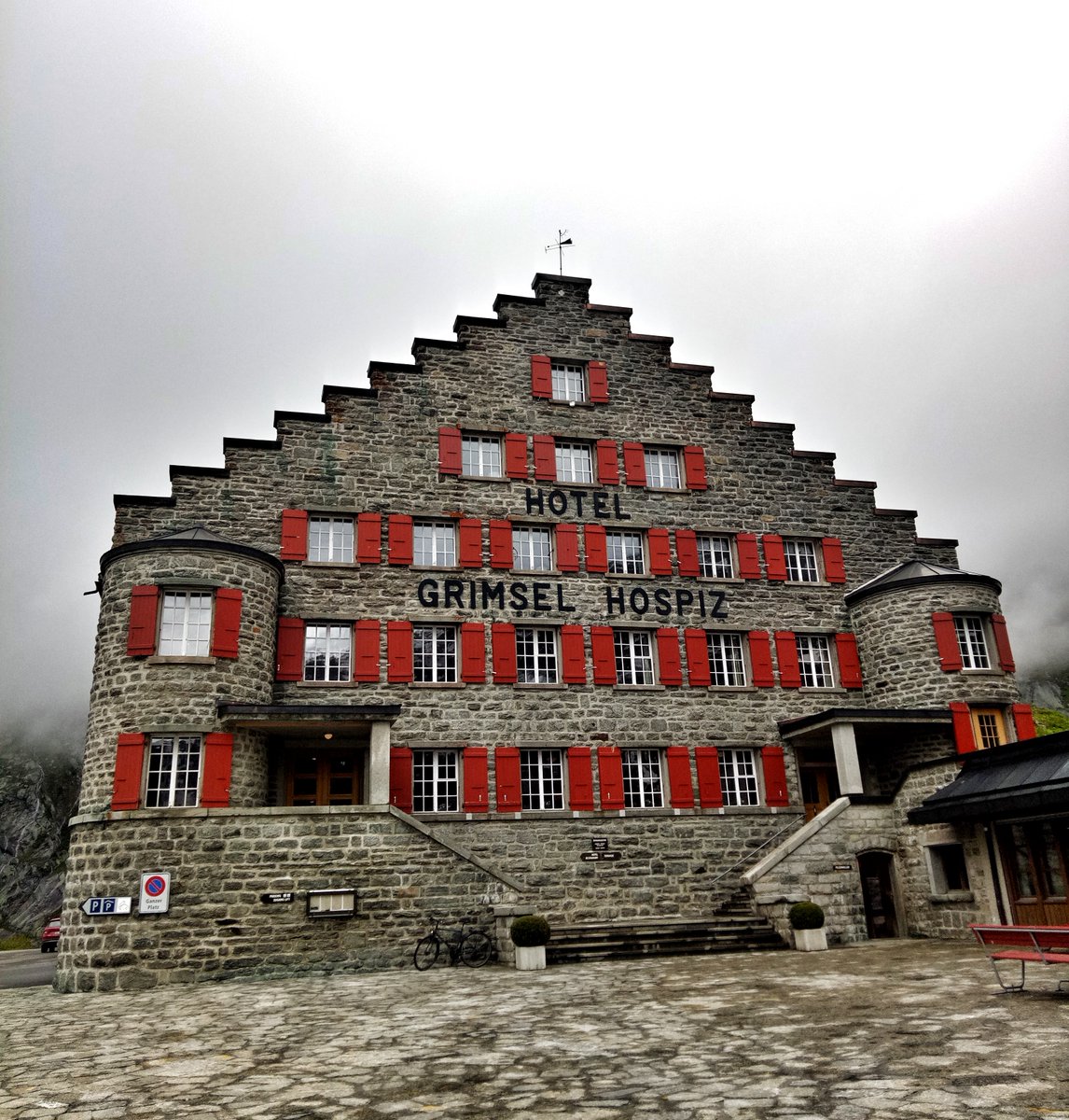 "for the last ¼ hour we could discern the regular rough paved road down to the hospice, and pick our way to avoid the snow that lay along it – at the hospice at 6 –"