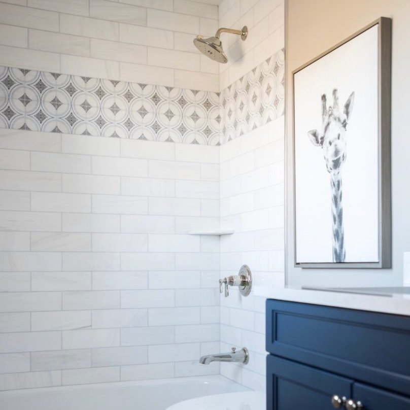 Add a few rows of tile to add a little pattern strip to your shower.  This will create the perfect contrast of neutral and patterned tiles. 

#studiotileandstone #patterntile #tileenvy #tilestyle #tile #suntreefl #stoneimpressions #tiletip #StayHomeStaySafe