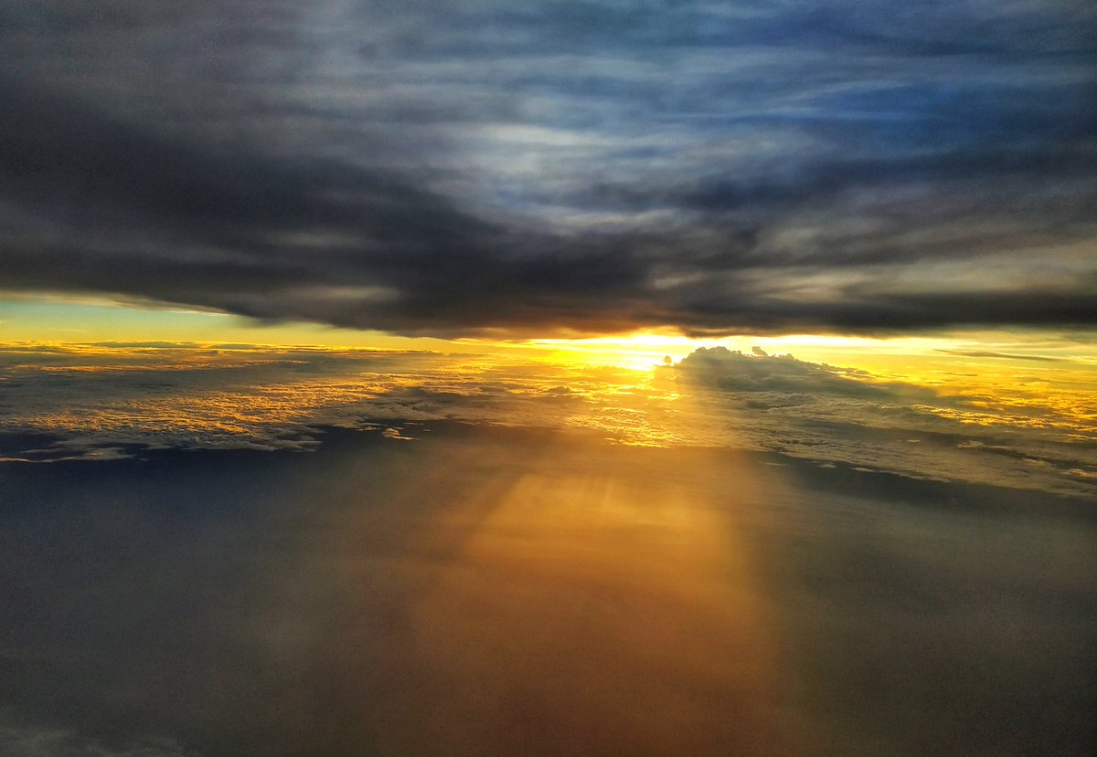 sunrise from plane is so mesmerising . .The tuft of clouds, the streaks of light, various shades of grey, annotated with hues. ... #mynortheastclix  #shadesofsun #assam #NorthEast  #everydayNEIndia  #photographer  #sunrisephotography  #aviationphotography