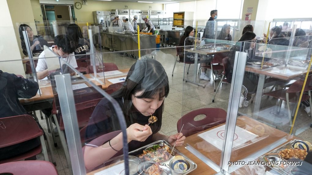 Cafeterias look like exam halls with desks spaced out. Temperatures are checked, shared computers are unplugged, and there are no sports. For some, school has been reduced to a few hours a day or takes place only on alternating days.  https://on.wsj.com/2CCwDko&nbsp;