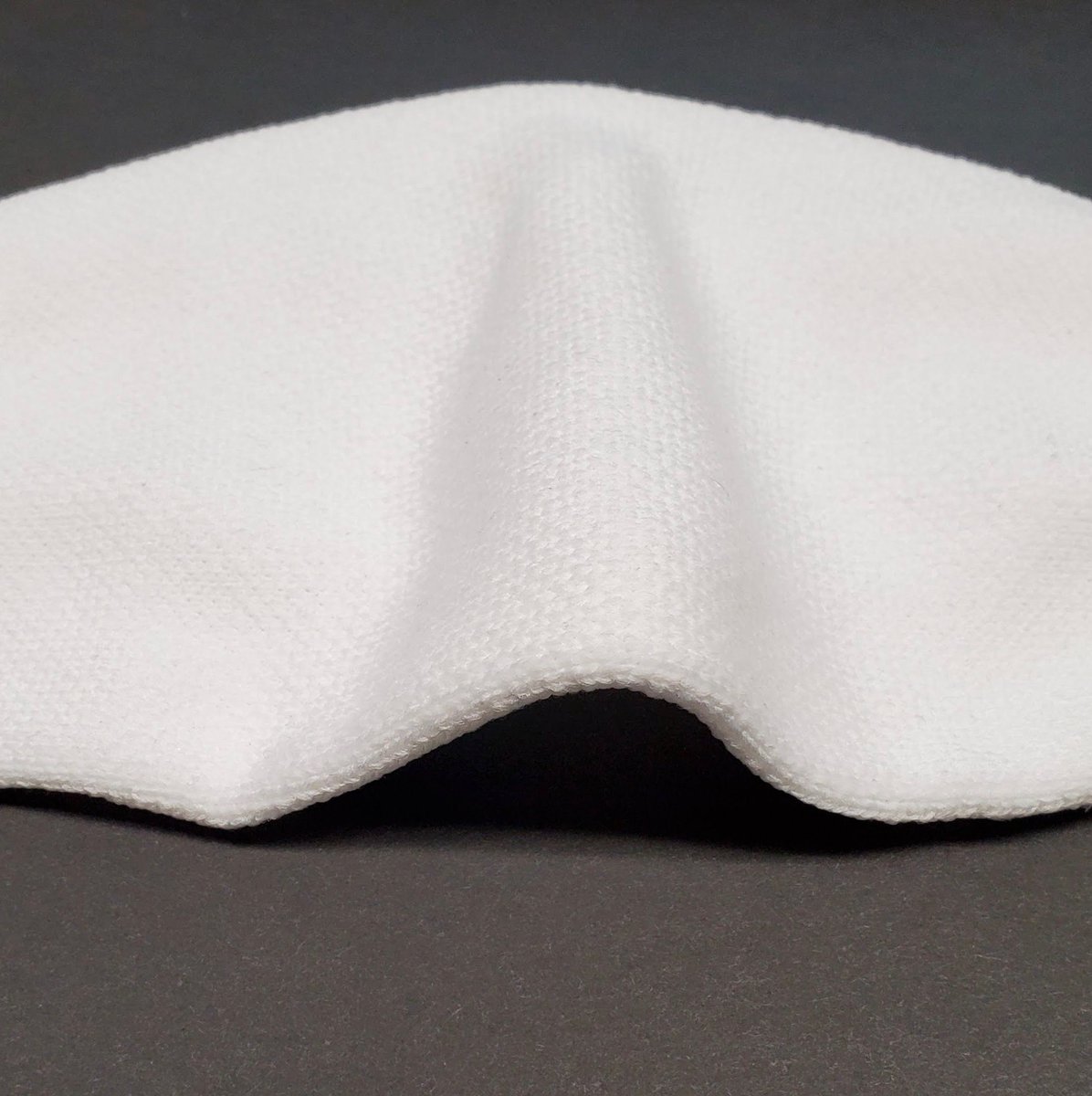 We have created an integrated pouch in our #washablefacecovering #nonmedical, #reusablemask to hold a #Canadian aluminum strip that helps mold the mask over the nose, & keeping the price very low at $3.00*. Help keep disposablemasks out of landfills. engraftprosocks.com/en/