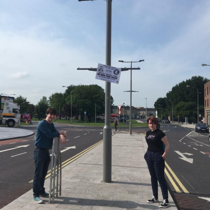 FFFLimerick's tweet photo. @CaitlinTalbot5 (@xryclarelk) and Eoghan from @XRLimerick were out and about today, putting up posters. Spot them all over town! 

We are doing a shoe protest to show that we're still here! 

See you tomorrow for shoe collection from 11:30-1 on Thomas Street! #ClimateAction https://t.co/jAshxLC8ky