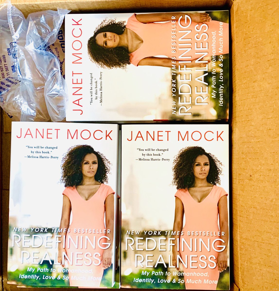 DinaDelicious's tweet photo. Look what just came in @janetmock #RedefiningRealness all of these copies will be shipped tmmrw to @LGBTBtP #girlslikeus there’s 9 here ! https://t.co/SqrbINnjeh