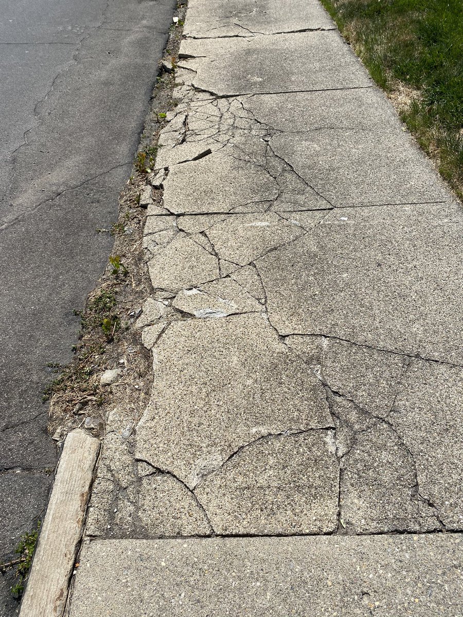 J_Skilling's tweet photo. @IndyDPW @IndyMayorJoe What’s the best way to get these sidewalks repaired? I often see children fall off scooters and elderly watch their footing during this stretch. Thanks! https://t.co/AlCilyxLZS