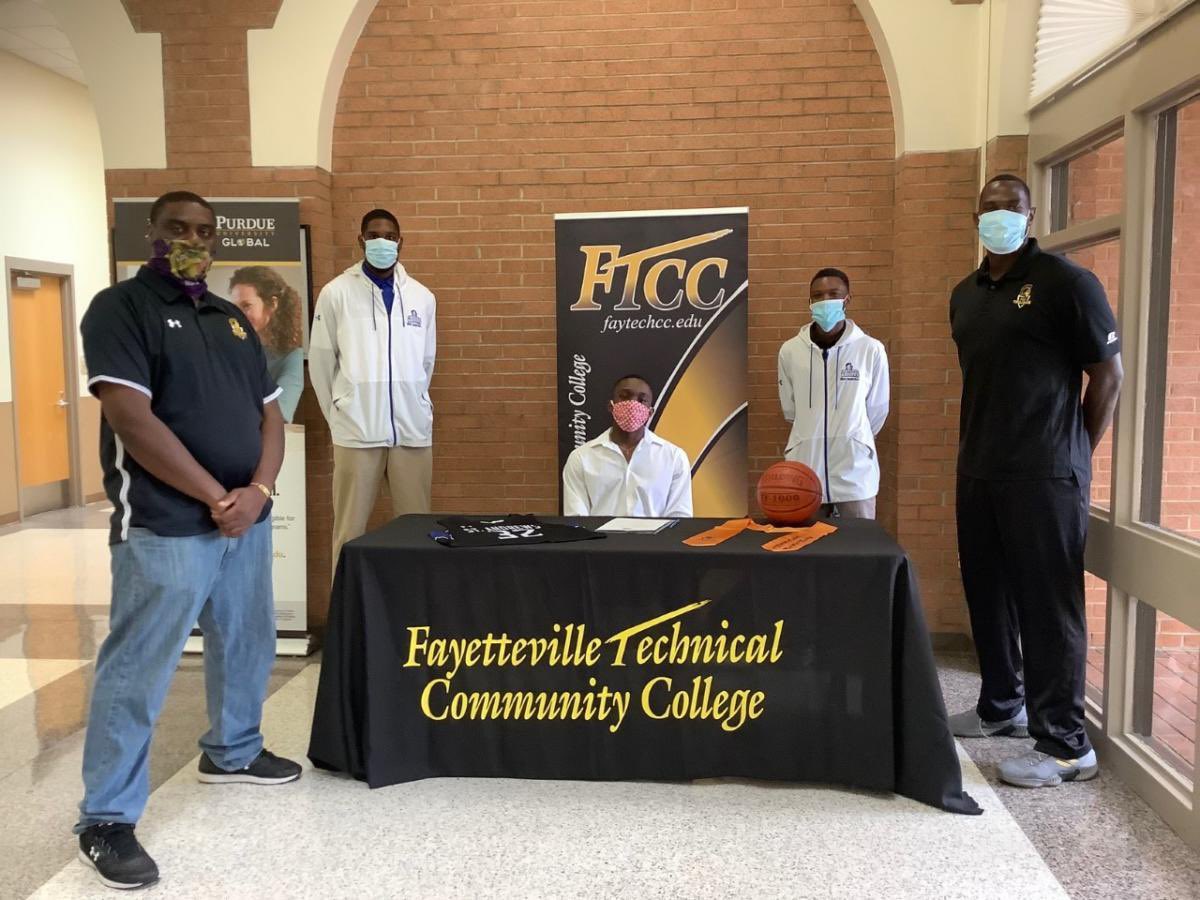 CoachDMcCain's tweet photo. Congratulations @shelovesmoove15 on signing with @StAndrewsUnive1!! Gabe will be very successful on and off the floor. #Trojan Family https://t.co/ZLNiFkDSU9