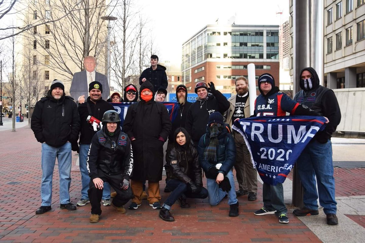 He definitely wasn't there at random. You can spot him behind the Trump flag in this lineup, standing next to Michael Moura. Other notables in this photo include Mark Sahady (2nd from left), John Camden (in the middle, helmet), and Brandon Navom (right of Camden).