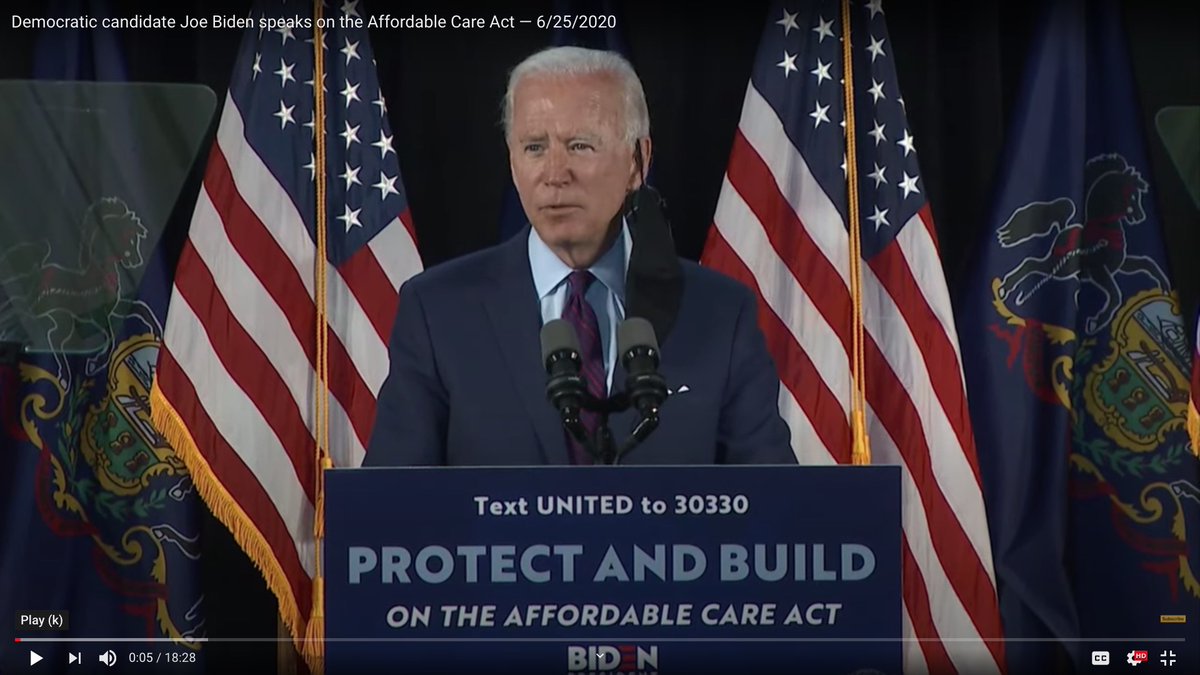 His mask apparently fell off his right ear.It dangled above his left shoulder like a bat.