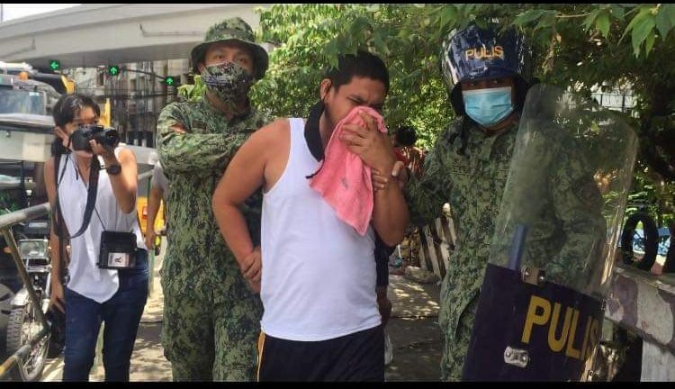 altermidya's tweet photo. BREAKING: Despite practicing social distancing, participants in this year's Pride March in Manila were apprehended &amp; nabbed by dozens of police. Updates to follow. https://t.co/8aVsQZAwjE