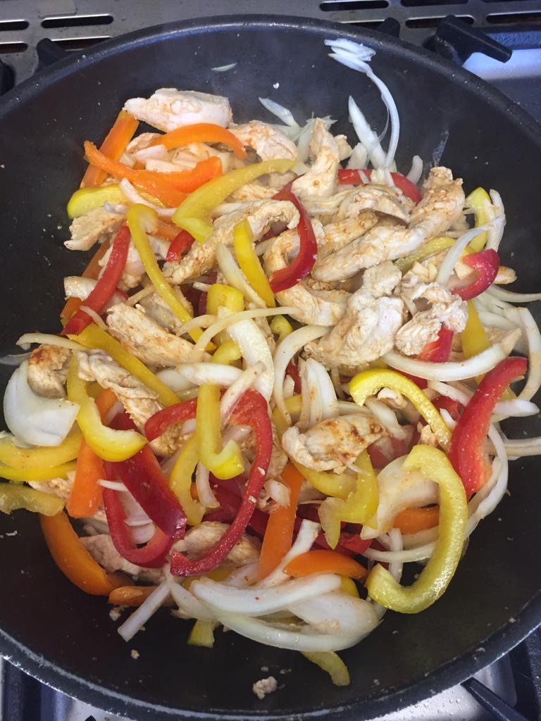 DelishHcs's tweet photo. Sharon @Royallib in her home kitchen "Stirring" It Up with her Chicken Fajitas #FoodInspiration #Lockdown #HomeCooking @HCS_LBH https://t.co/vmo67VcjwO