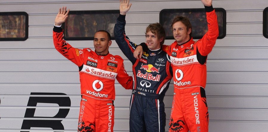 TotalMcLaren's tweet photo. .@McLarenF1 in red overalls at the 2011 Chinese Grand Prix 🔴 https://t.co/DwtkDG7Q8K