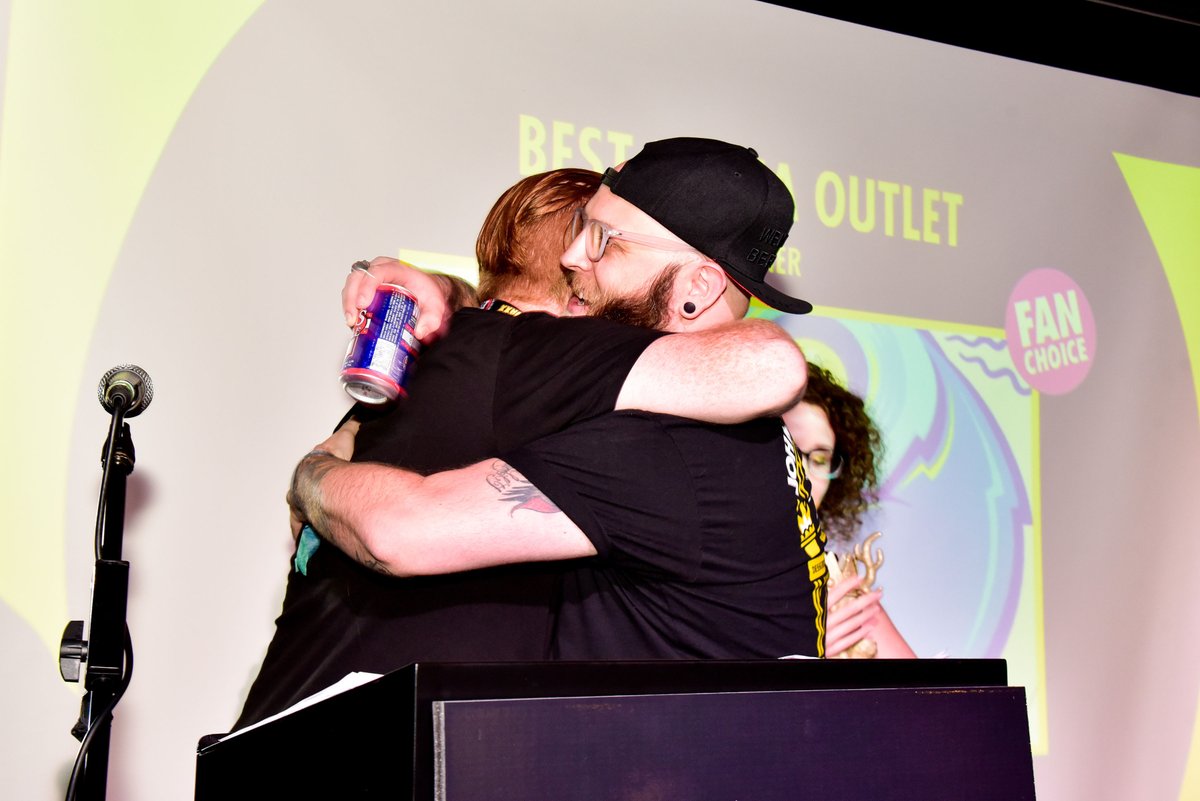 Five Points Festival (@fivepointsfest) on Twitter photo Remember hugging? We love this shot of @TTCBeard collecting the #DesignerToyAward for Best Media Outlet for <a href="/TheToyChronicle/">The Toy Chronicle</a> back in 2018! Featuring a cameo by <a href="/Kylekirwan/">kyle kirwan</a>! Remember hugging? We love this shot of @TTCBeard collecting the #DesignerToyAward for Best Media Outlet for <a href="/TheToyChronicle/">The Toy Chronicle</a> back in 2018! Featuring a cameo by <a href="/Kylekirwan/">kyle kirwan</a>!