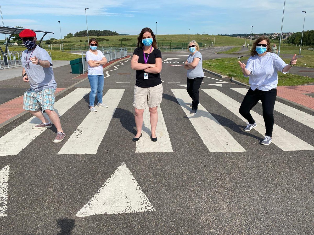 EHSEnglishDept's tweet photo. EHS English Dept reunited today clearing our classes. Had to reenact some of our favourite photo shoots. #humancontact #froma2meterdistance https://t.co/JbNXJ4puHg